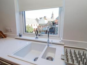 a kitchen sink in front of a window at Amber Rose in Berwick-Upon-Tweed +33 photos