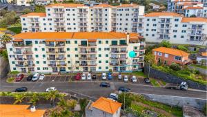 an aerial view of a large apartment building at Emerald Scape Garajau Madeira Cristo Rei Area in Caniço