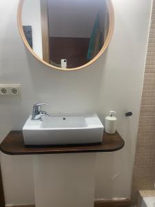 a bathroom with a sink and a mirror at Estavar in Estavar