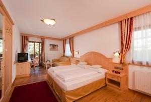Letto o letti in una camera di Hotel Digon