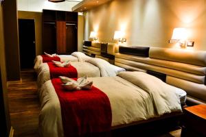 Katil atau katil-katil dalam bilik di Hotel Royal Qosqo
