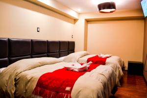 Katil atau katil-katil dalam bilik di Hotel Royal Qosqo