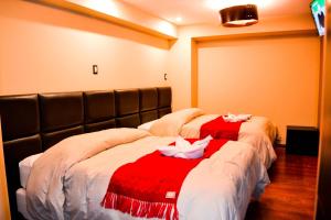 Katil atau katil-katil dalam bilik di Hotel Royal Qosqo