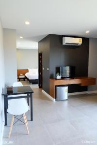 Kuchyň nebo kuchyňský kout v ubytování C Cha-Am Hotel