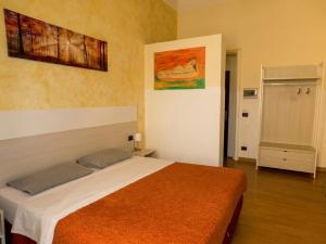 Llit o llits en una habitació de San Max Hotel