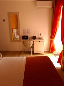 Llit o llits en una habitació de San Max Hotel