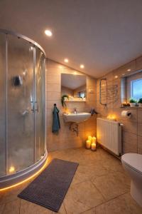 a bathroom with a shower and a sink at Bled Vista Apartments in Bled +29 photos