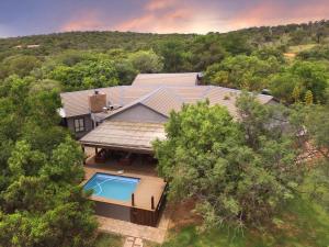 an overhead view of a house with a swimming pool at Elements Private Golf Reserve 109 in Moheme