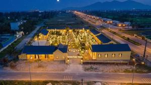 an aerial view of a building with christmas lights at Serena Xuân Thành Hotel in Hà Tĩnh