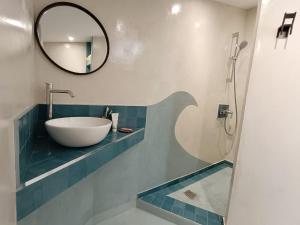a bathroom with a sink and a mirror at Villa de la Baume in Gémenos +13 photos