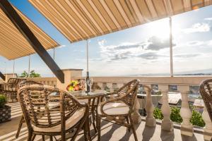 Rõdu või terrass majutusasutuses Arève Résidence Boutique Hotel
