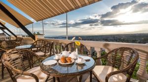 Rõdu või terrass majutusasutuses Arève Résidence Boutique Hotel