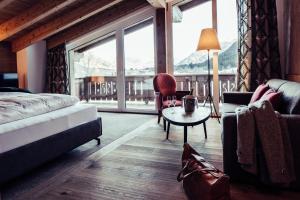Posteľ alebo postele v izbe v ubytovaní Biohotel Bergzeit