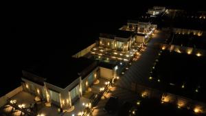 an overhead view of a building with lights at night at Summit Springs Resorts in Bagru
