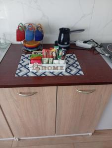 a counter with a table with food on it at Stan na dan ,, Vidovdan ,, in Nevesinje +9 photos