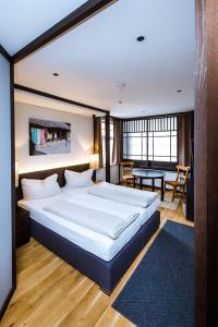 Ένα ή περισσότερα κρεβάτια σε δωμάτιο στο Hotel zur Amtspforte