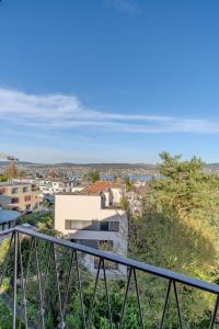 a view from the balcony of a house at Vanilla Suite · Kilchberg in Kilchberg