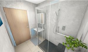 a bathroom with a shower with a glass door at Martha's Alpine Apartment in Obsteig