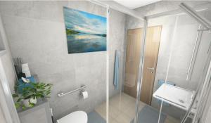 a bathroom with a toilet and a glass shower at Martha's Alpine Apartment in Obsteig
