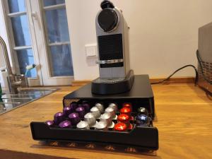 a coffee machine sitting on top of a table at Im Herzen der Altstadt in Heidelberg