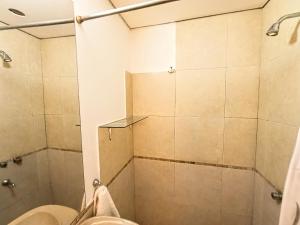 a bathroom with a shower and a sink at La Morenita dos dormitorios in Chilecito +39 photos