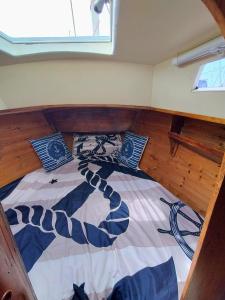 a bed in the corner of a room at Miramare in Playa Blanca