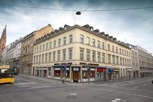 a large building on a city street with at Hotel Luisenhof Wiesbaden - Innenstadt und RMCC in Wiesbaden
