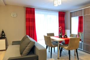 Posedenie v ubytovaní Apartamenty BM'Kruk