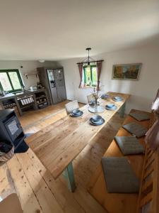 an aerial view of a living room with a wooden floor at Chata nad řekou Otavou in Vojníkov