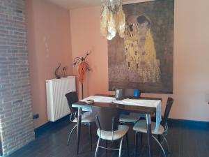 a dining room with a table and chairs at Mulberry Tree in Agia Anna