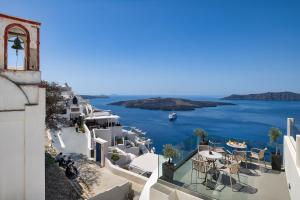a view of the ocean from a building at Athina Luxury Suites in Fira