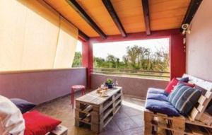 a room with a couch and a table and a window at Gorgeous Apartment Garma in Kavran