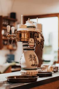 a food processor sitting on top of a table at Landhotel Herscheider Mühle in Herscheid +21 photos