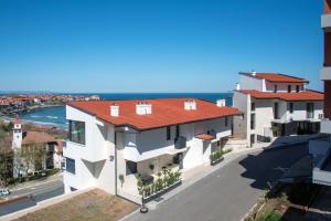 arial view of a house with a red roof at Студия Морска хармония in Sozopol