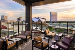 a restaurant with a view of a city skyline at Moxy Atlanta Downtown in Atlanta