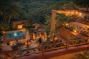 an overhead view of a resort with a pool at Riad Des Vieilles Charrues in Boumalne Dades