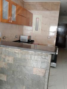 a kitchen with a counter top and a sink at Hurghada, El-Marina in Hurghada