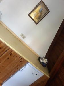 an overhead view of a stairway with a picture on a wall at Joyosada - Ferienhäuser in Seenlandschaft in Prusim