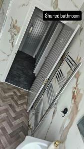an overhead view of a staircase in a bathroom at The Queens Hotel in Rhondda +27 photos