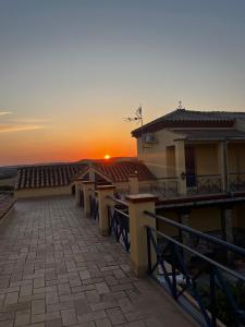 a view of a sunset from the roof of a house at Chalet Suizo in Arcos de la Frontera