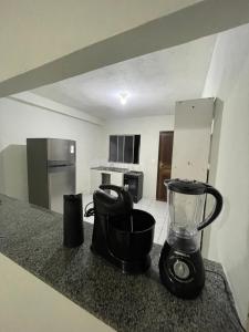 a blender sitting on a counter in a kitchen at Casa em Seabra in Seabra +4 photos