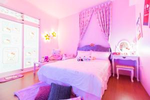 Katil atau katil-katil dalam bilik di Mandy's House B&B