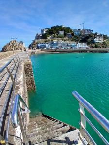 a view of the beach from the pier at Studio très belle vue mer in Pléneuf-Val-André