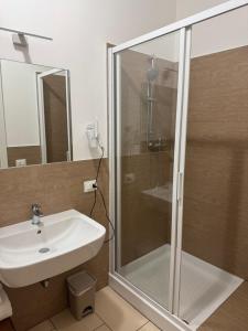 a bathroom with a shower and a sink at Villa Flavia in Arezzo