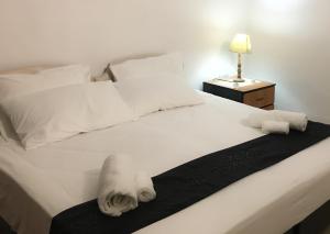 Voodi või voodid majutusasutuse D'Ambrogio Guest House toas