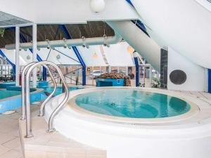 a pool on a cruise ship with a hot tub at 4 person holiday home in Hejls-By Traum in Hejls