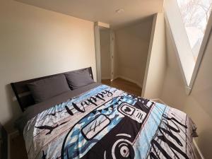 a bedroom with a bed in a small room at Blue Bayou Dome cottages in Dingwall