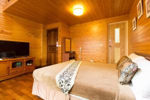 Televisyen dan/atau pusat hiburan di Mandy's House B&B