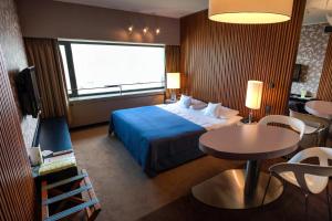Postel nebo postele na pokoji v ubytování Hotel Yasmin Košice