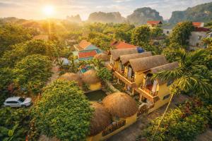 an aerial view of a house with thatched roofs at Sora Traditional Homestay in Ninh Binh